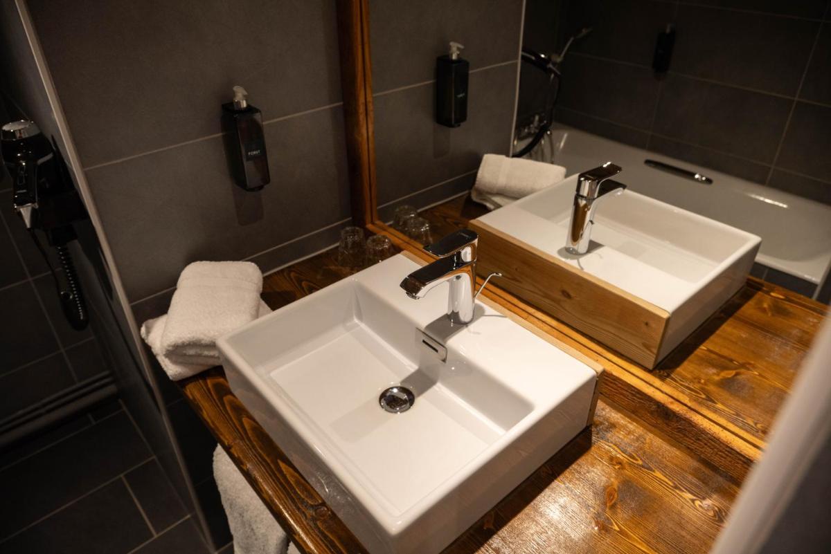 Salle de bains dans l'établissement Chalet Hôtel & Spa Le Collet