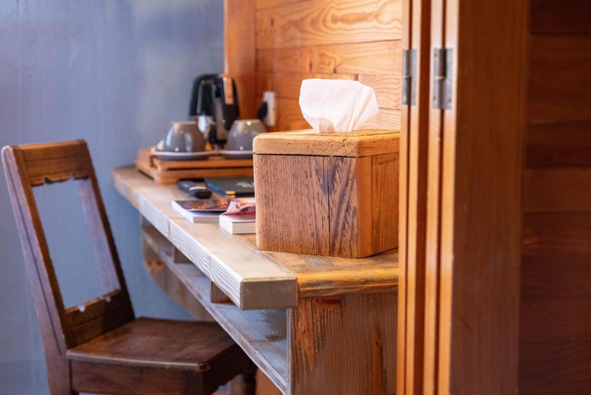 Cuisine ou kitchenette dans l'établissement Chalet Hôtel & Spa Le Collet