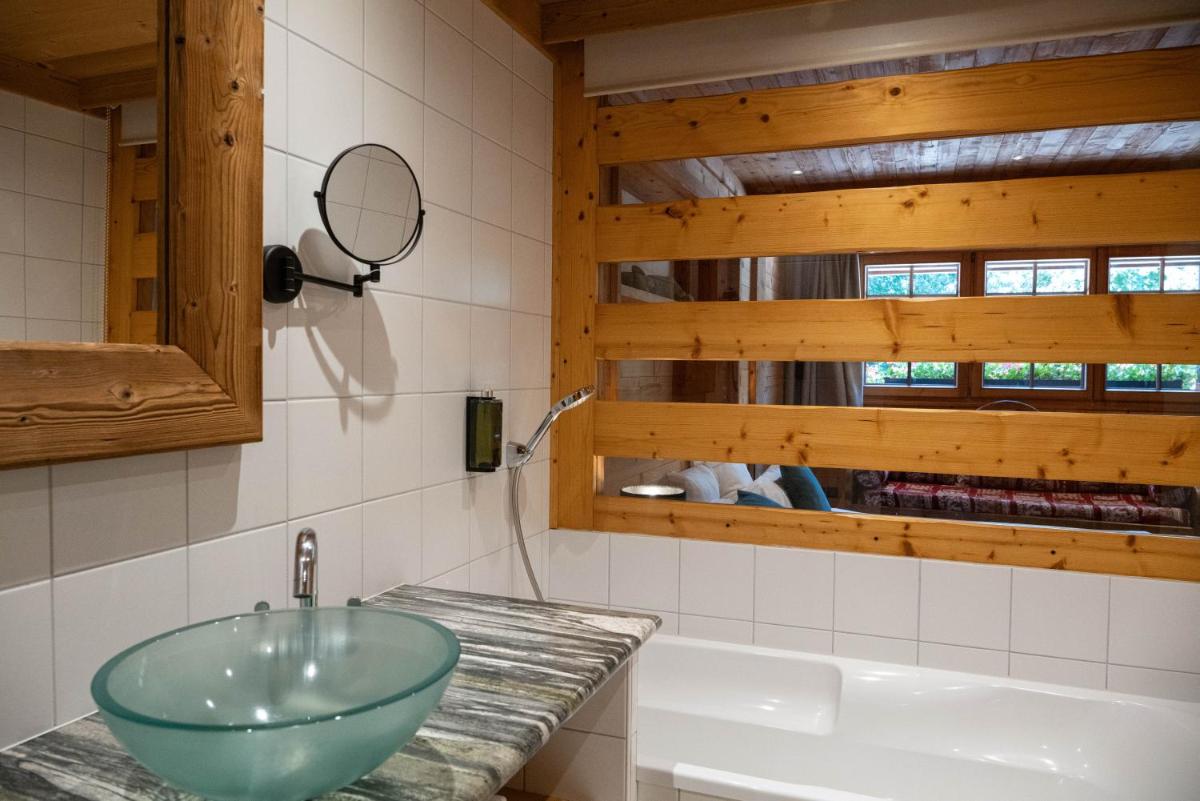 Salle de bains dans l'établissement Chalet Hôtel & Spa Le Collet