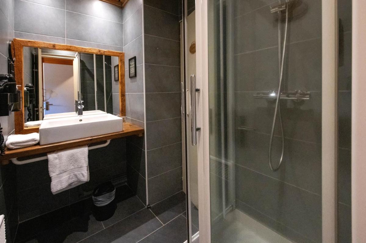 Salle de bains dans l'établissement Chalet Hôtel & Spa Le Collet