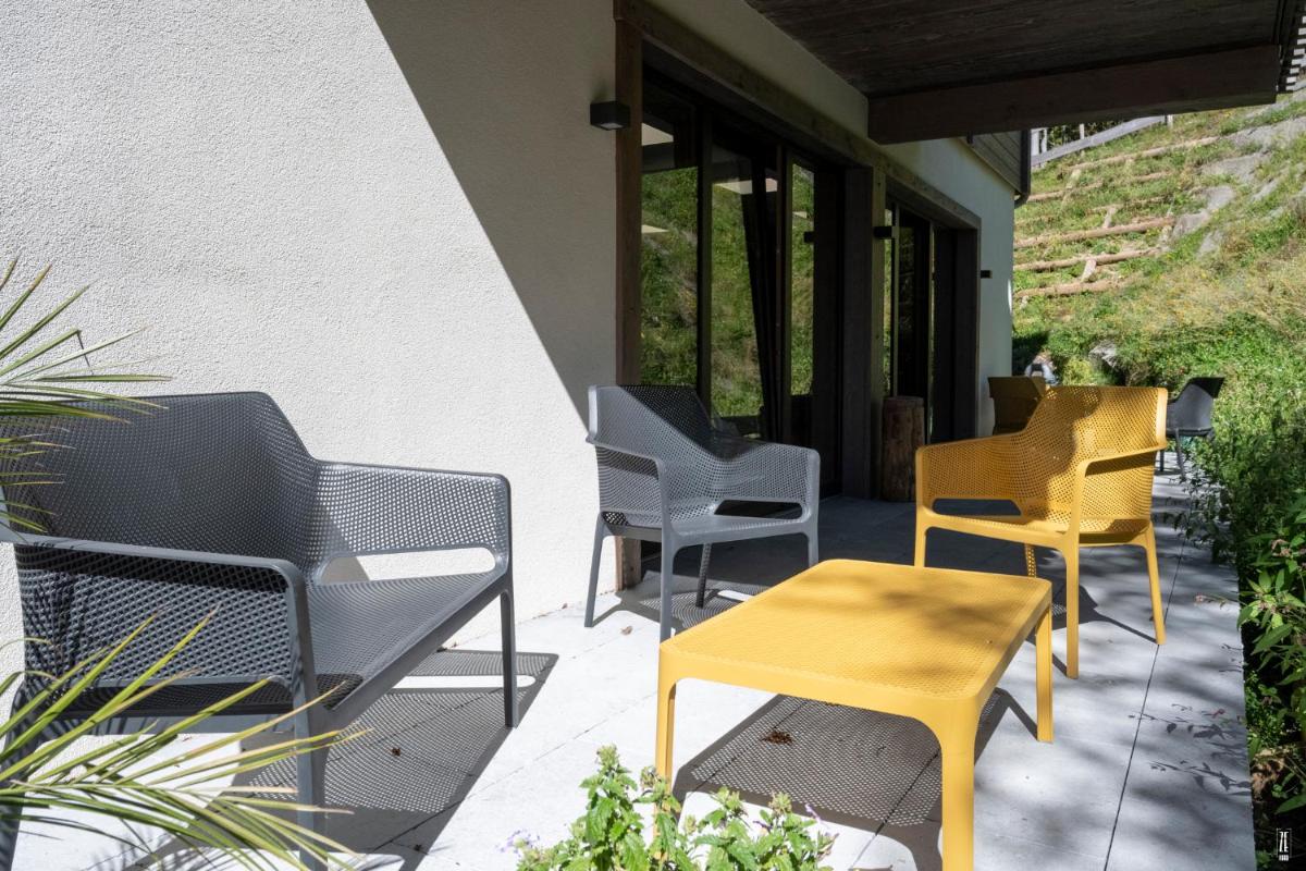 Coin salon dans l'établissement Chalet Hôtel & Spa Le Collet
