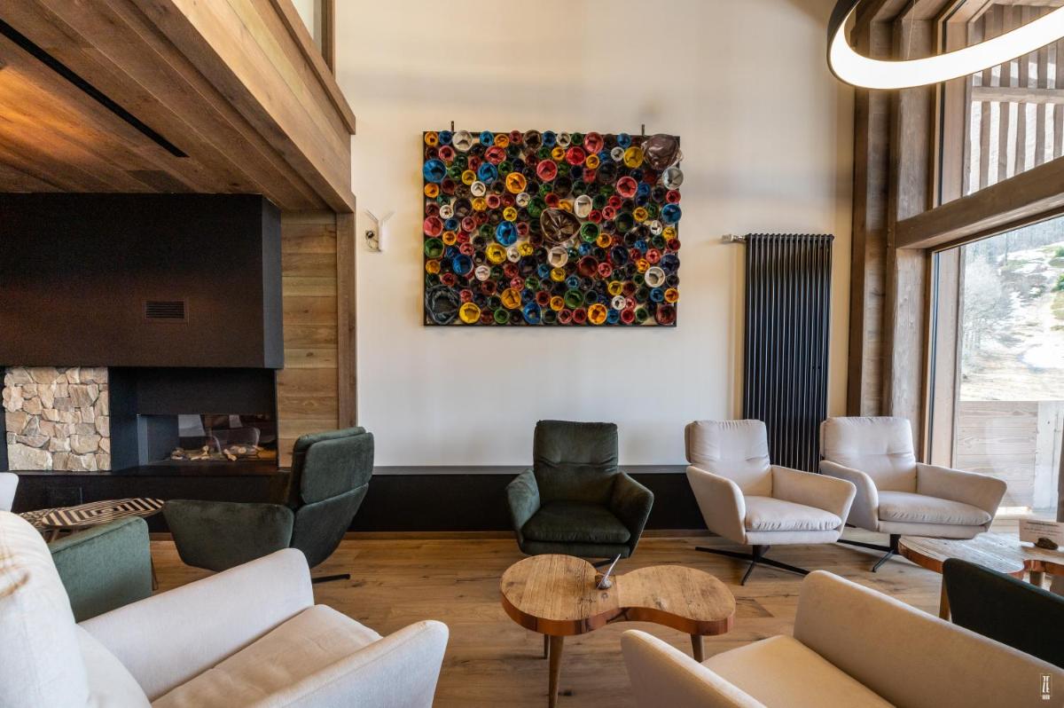 Coin salon dans l'établissement Chalet Hôtel & Spa Le Collet
