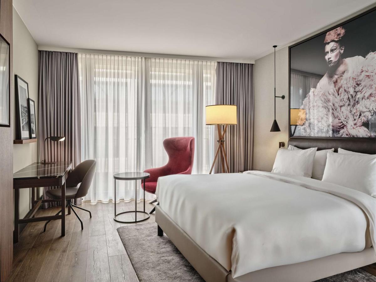 Ein Bett oder Betten in einem Zimmer der Unterkunft Radisson Collection Hotel, Berlin