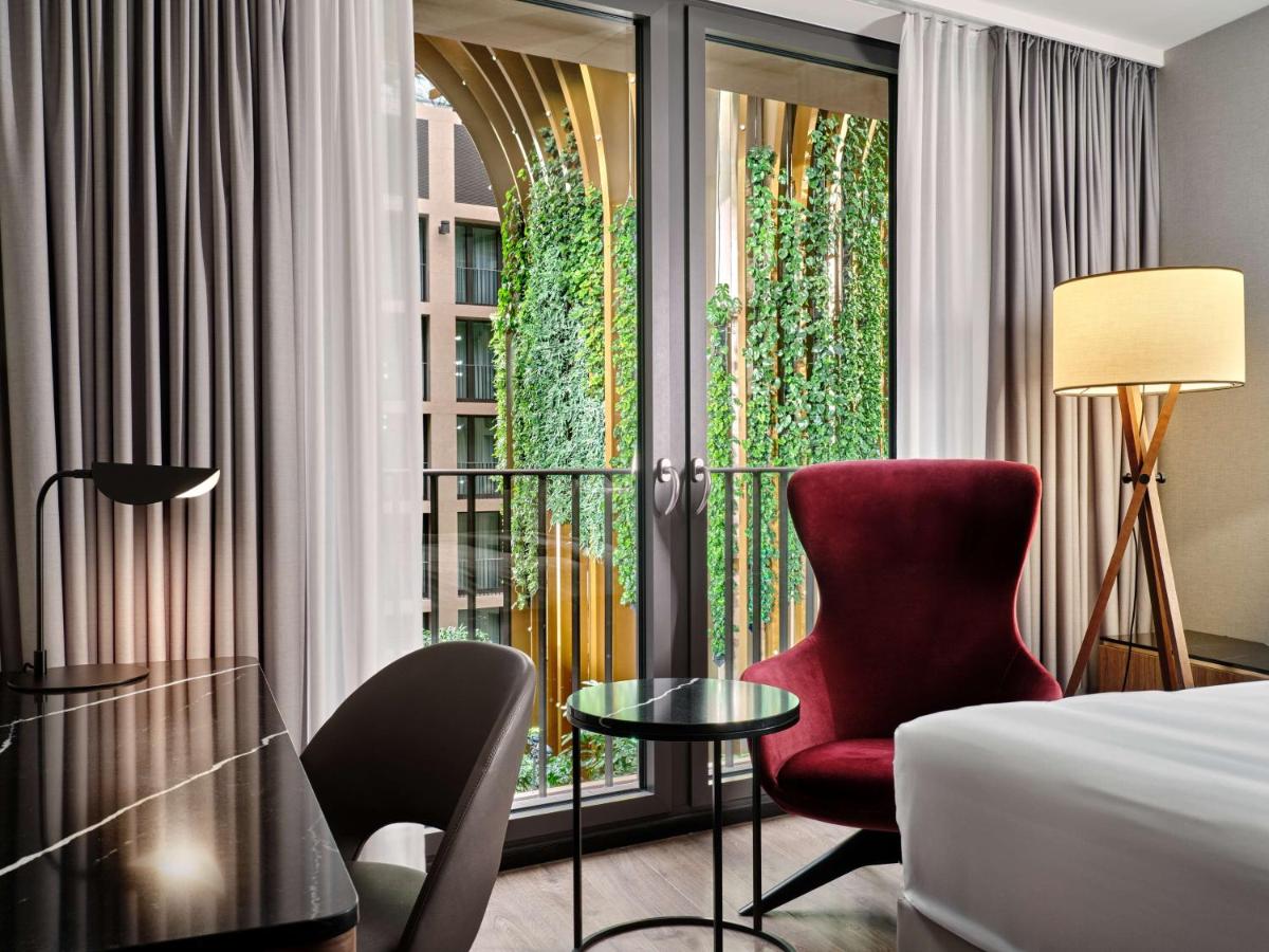 Ein Bett oder Betten in einem Zimmer der Unterkunft Radisson Collection Hotel, Berlin