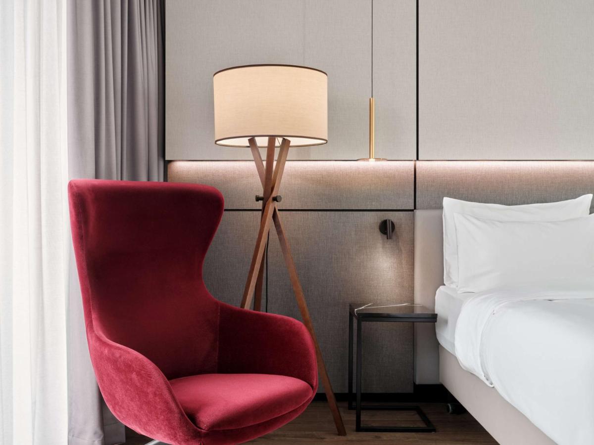 Ein Bett oder Betten in einem Zimmer der Unterkunft Radisson Collection Hotel, Berlin