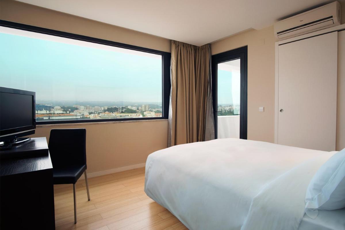 Uma cama ou camas num quarto em Sweet Atlantic Hotel & Spa