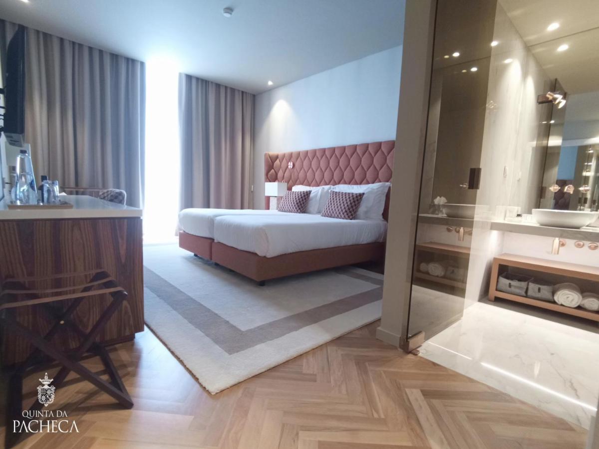 Uma cama ou camas num quarto em Pacheca The Wine House Hotel e Spa - Quinta da Pacheca