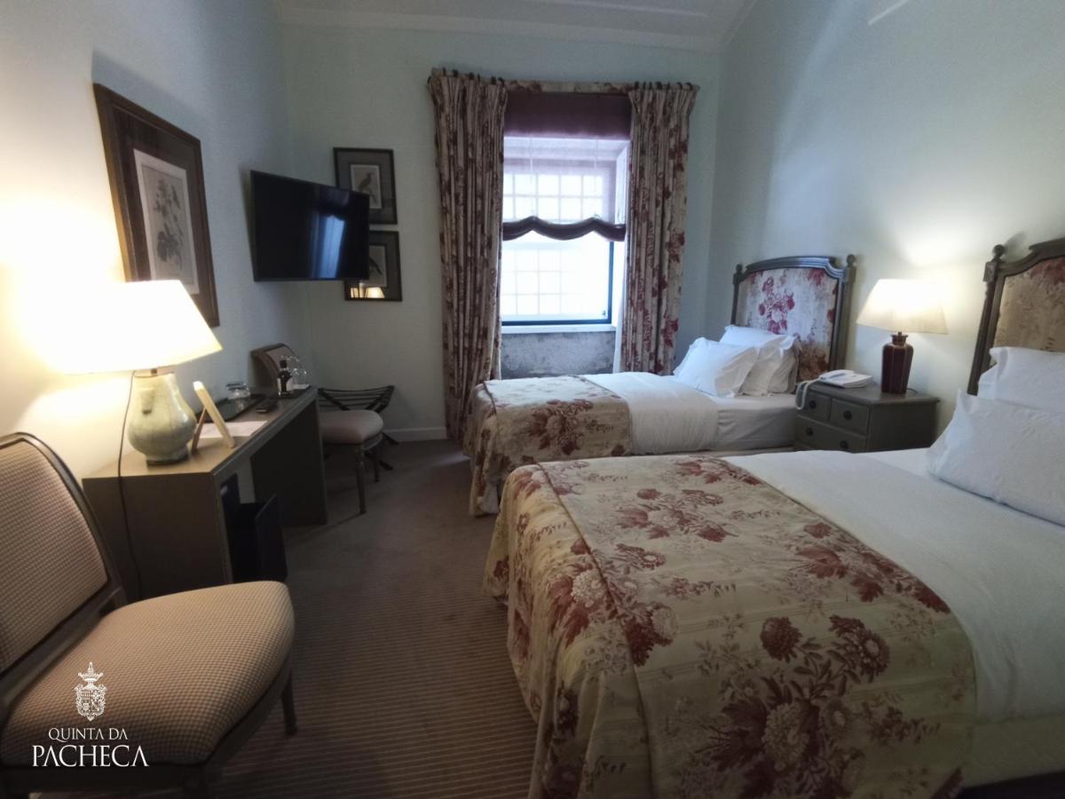 Uma cama ou camas num quarto em Pacheca The Wine House Hotel e Spa - Quinta da Pacheca