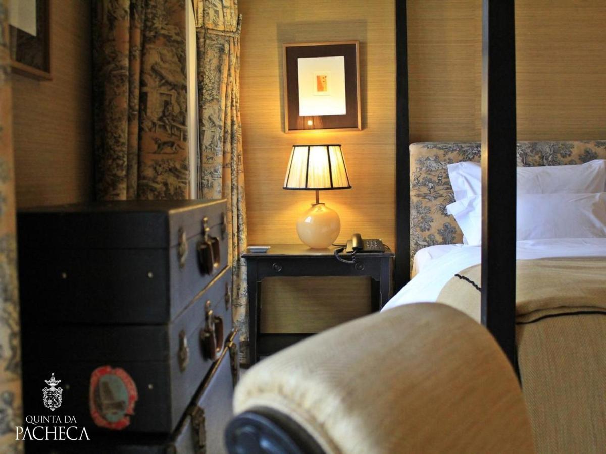 Uma cama ou camas num quarto em Pacheca The Wine House Hotel e Spa - Quinta da Pacheca