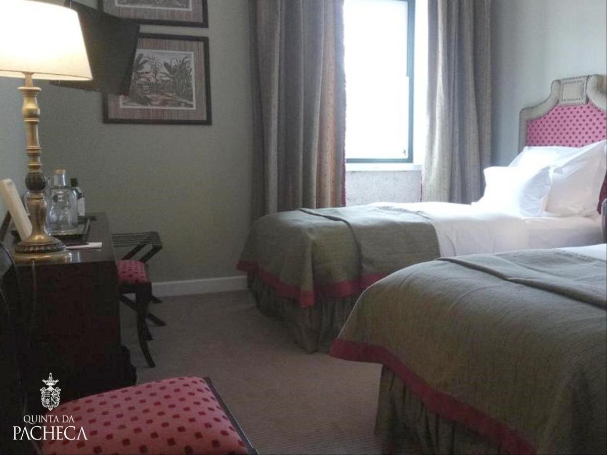 Uma cama ou camas num quarto em Pacheca The Wine House Hotel e Spa - Quinta da Pacheca