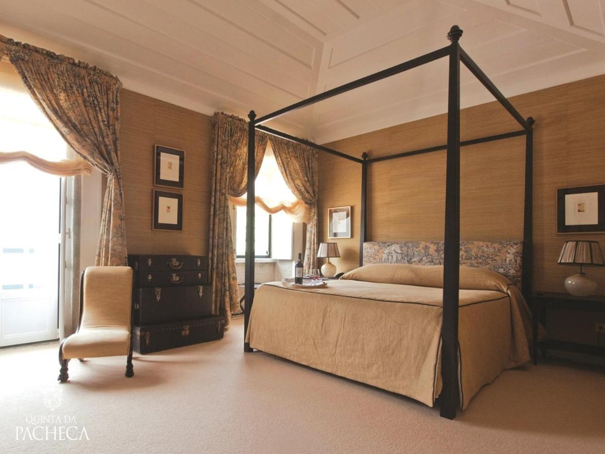 Uma cama ou camas num quarto em Pacheca The Wine House Hotel e Spa - Quinta da Pacheca