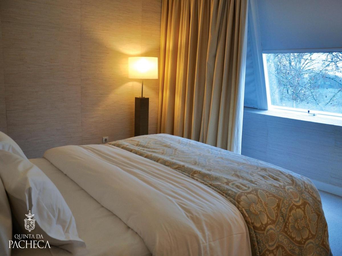 Uma cama ou camas num quarto em Pacheca The Wine House Hotel e Spa - Quinta da Pacheca