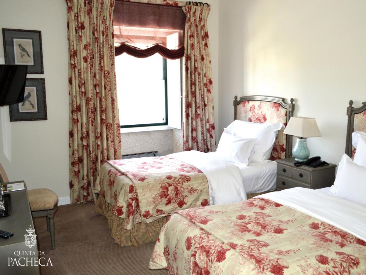 Uma cama ou camas num quarto em Pacheca The Wine House Hotel e Spa - Quinta da Pacheca