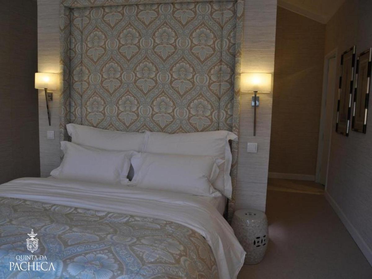 Uma cama ou camas num quarto em Pacheca The Wine House Hotel e Spa - Quinta da Pacheca
