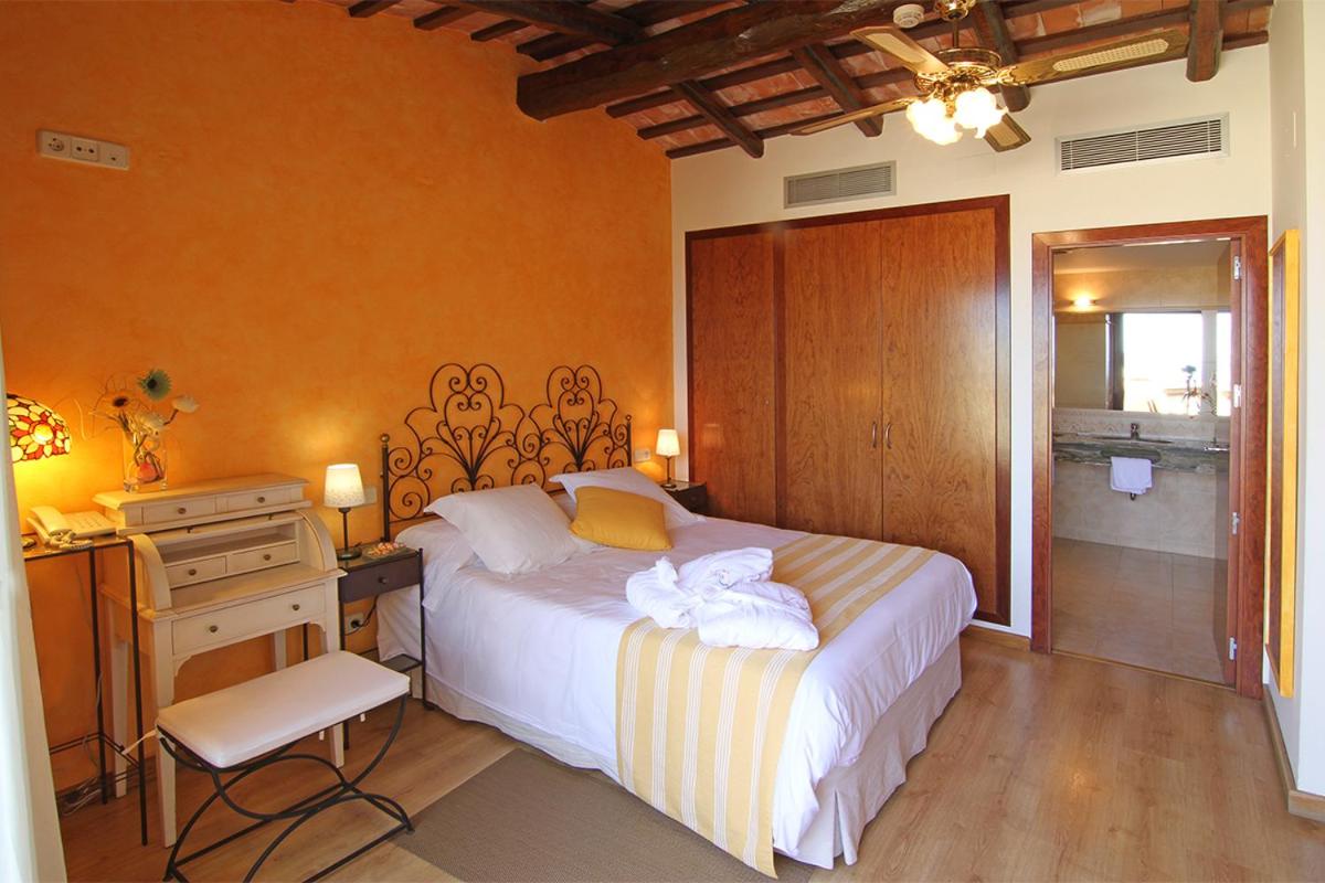 Cama o camas de una habitación en Hotel Rosa & Spa Begur