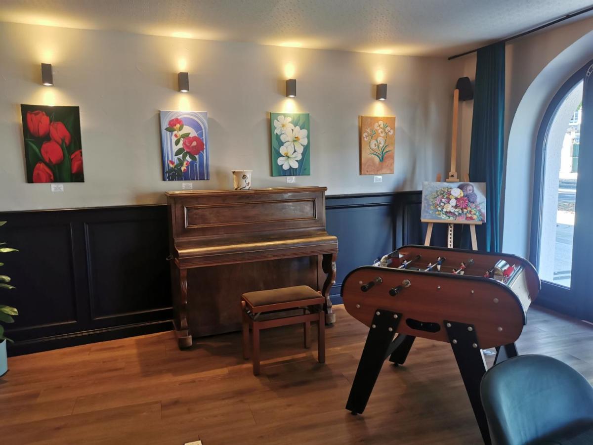 Coin salon dans l'établissement Hotel Normandy