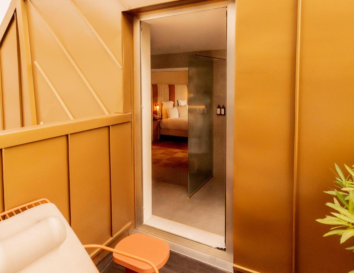 Un ou plusieurs lits dans un hébergement de l'établissement Hôtel Pilgrim