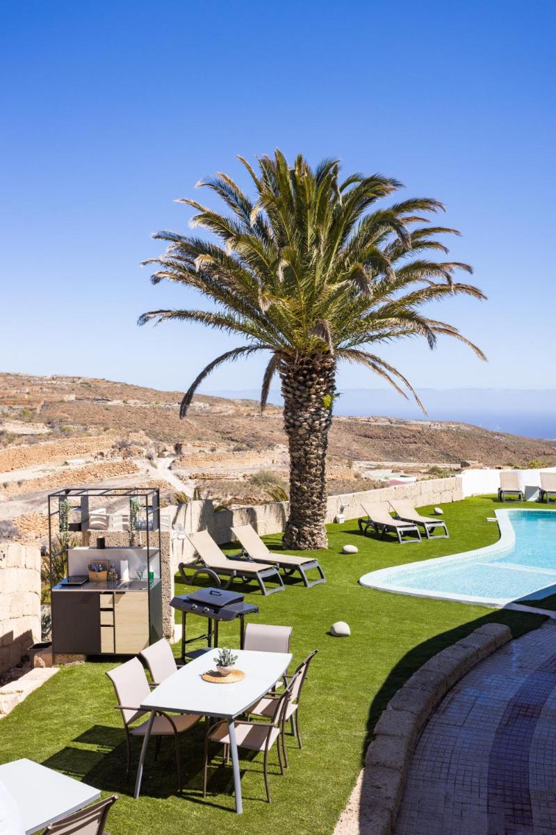Oasis Tenerife Rentals con Piscina climatizada, Cocina exterior y Barbacoa - Housity