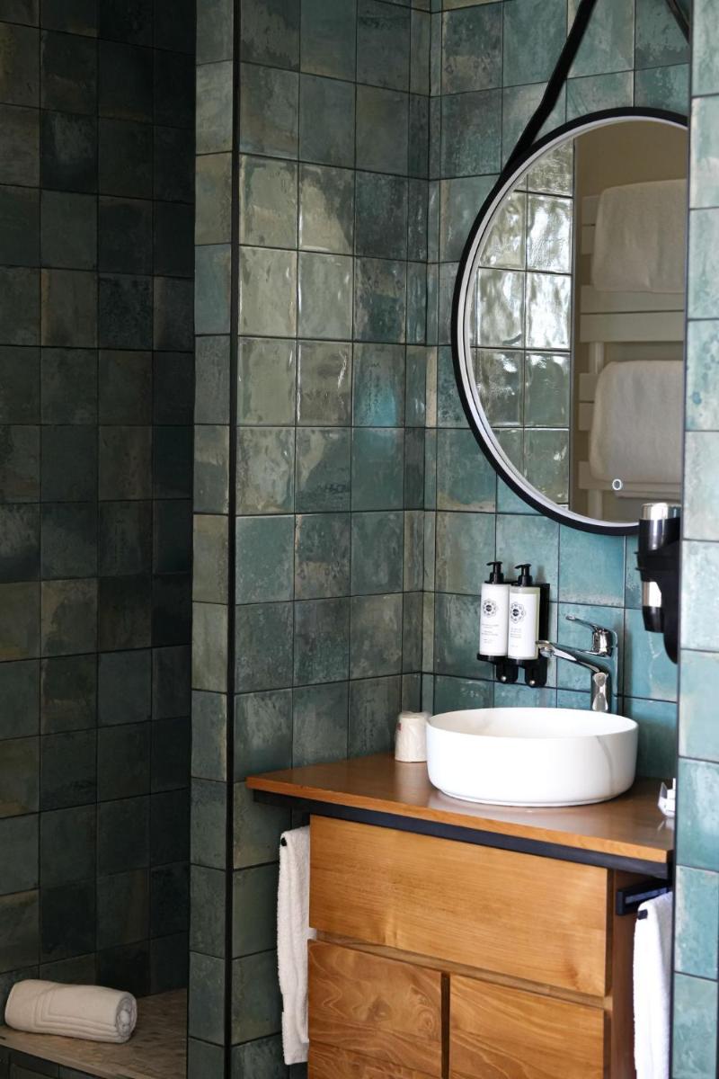 Salle de bains dans l'établissement Maison Bérard Hôtel - Restaurant - Spa