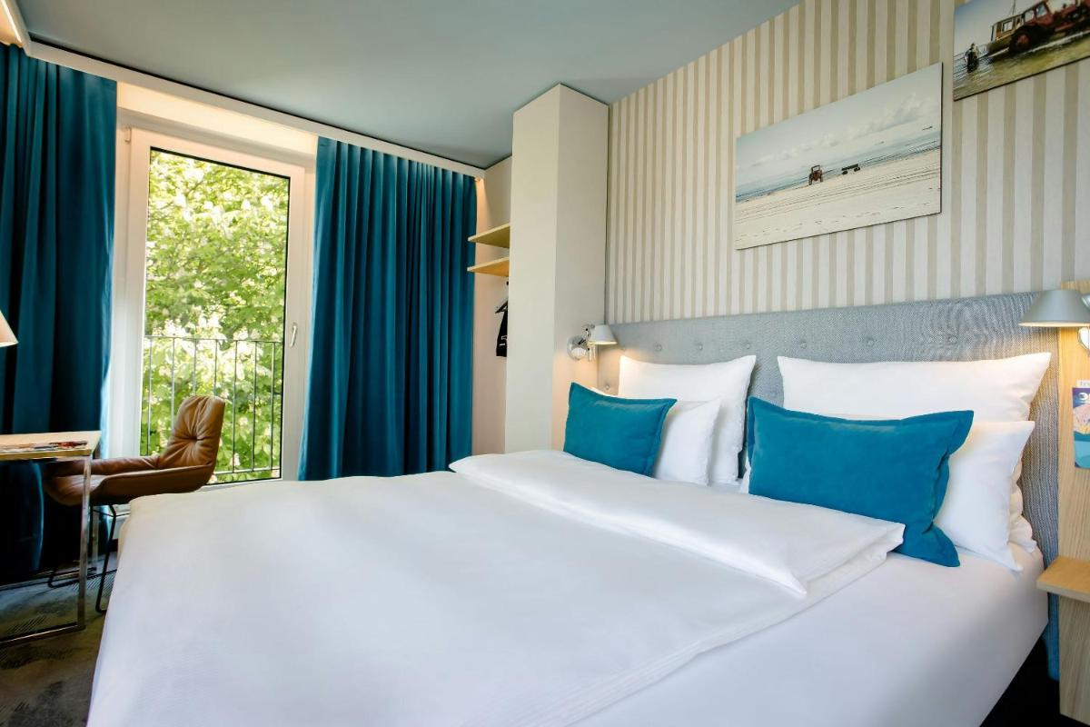 Motel One Rostock - Housity