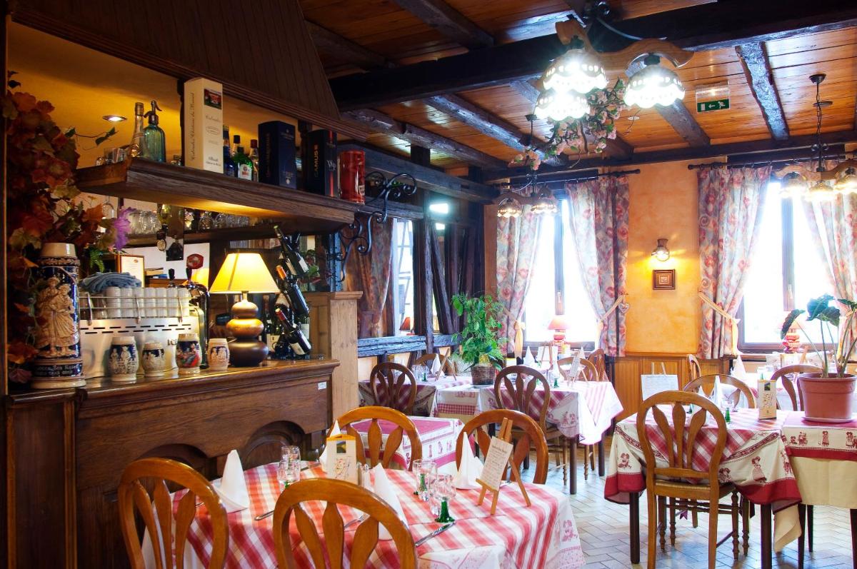 Restaurant ou autre lieu de restauration dans l'établissement Au Soleil, Hôtel Restaurant & Spa