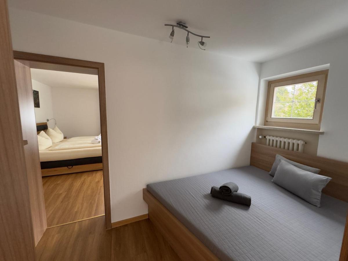 Ein Bett oder Betten in einem Zimmer der Unterkunft Alpenglühn Apartments - Adult Only