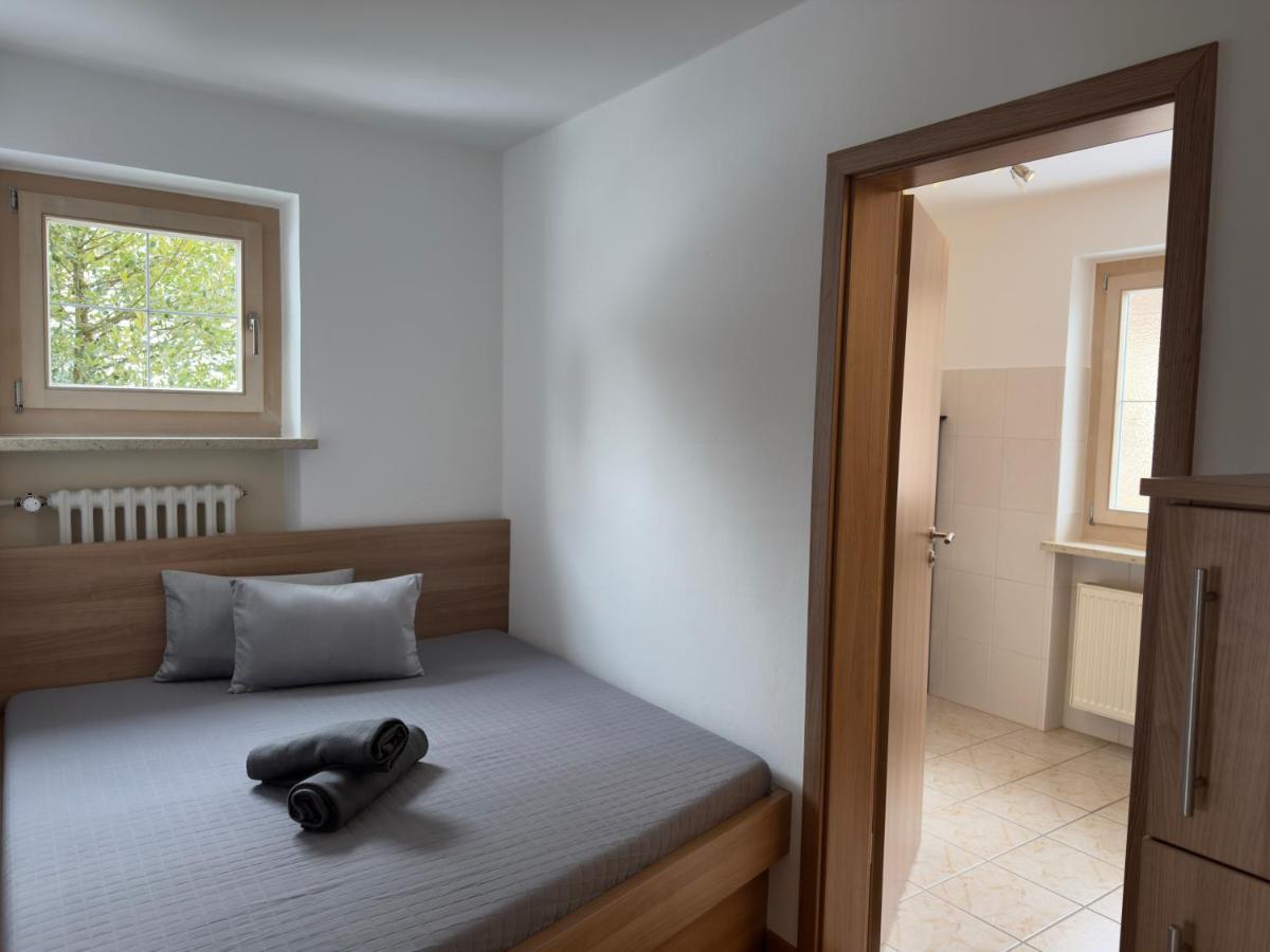 Ein Bett oder Betten in einem Zimmer der Unterkunft Alpenglühn Apartments - Adult Only