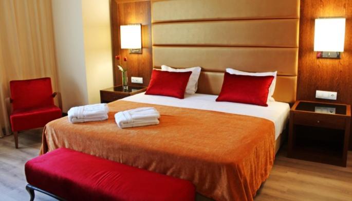 Uma cama ou camas num quarto em Palace Hotel Astúrias & Spa