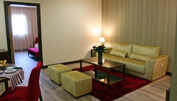 Uma área de estar em Palace Hotel Astúrias & Spa