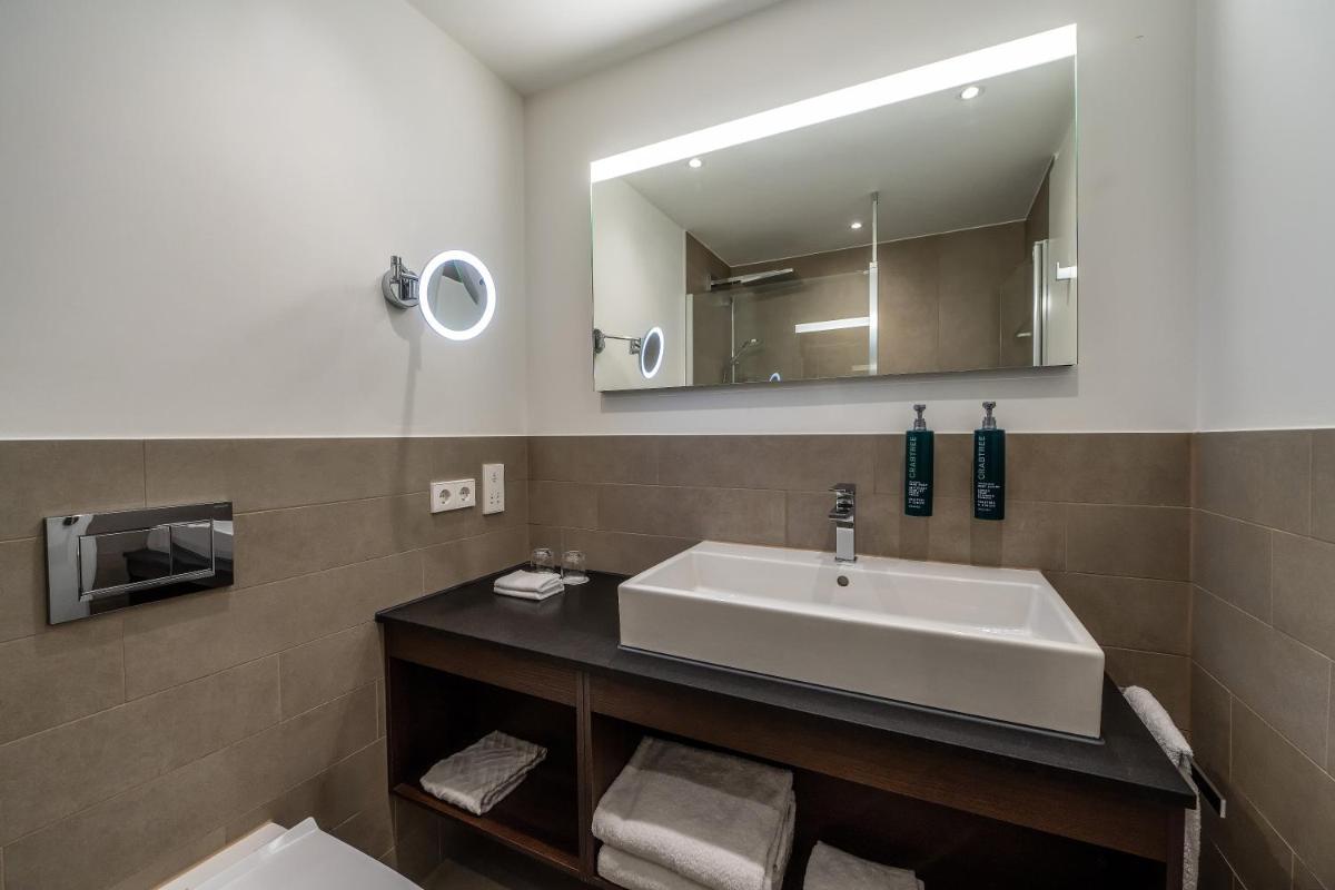 Ein Badezimmer in der Unterkunft Hilton Mainz