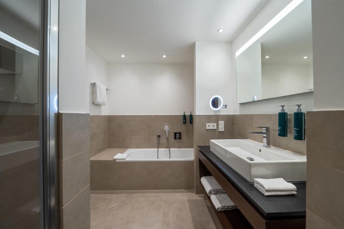 Ein Badezimmer in der Unterkunft Hilton Mainz