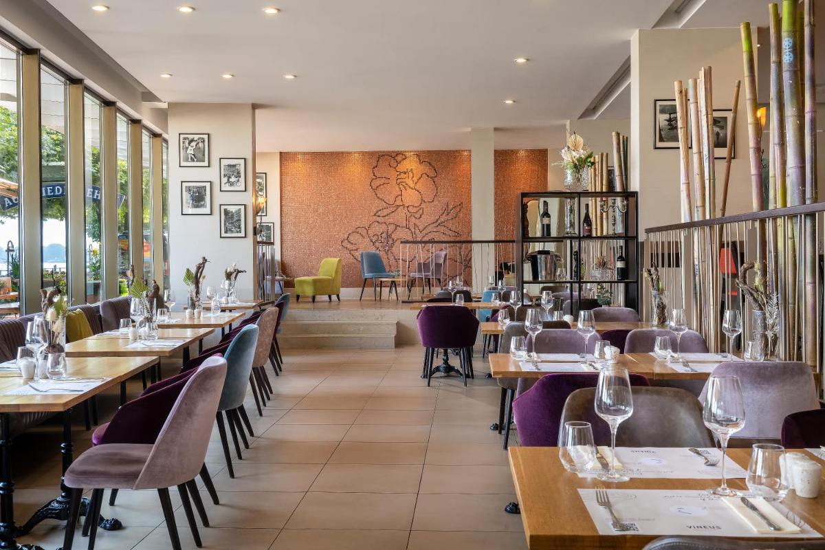 Ein Restaurant oder anderes Speiselokal in der Unterkunft Hilton Mainz