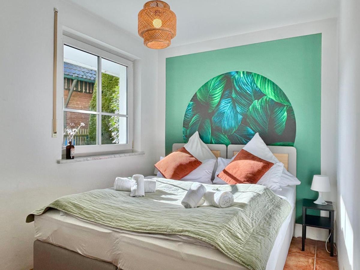 Snug Stays 1 I 3-Zimmer Design Apartment am See mit Garten I Home Office I Highspeed Wifi - Housity