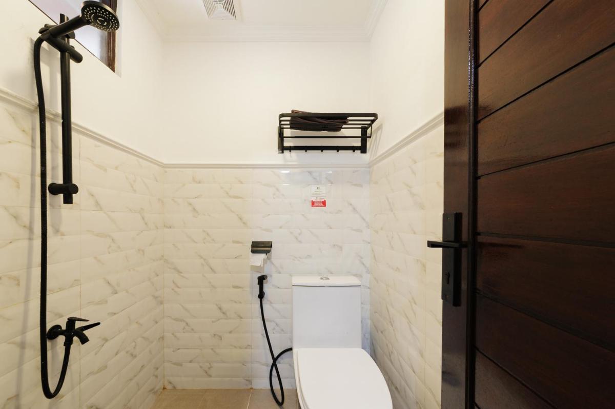 RedDoorz at Raujan Guesthouse Syariah Banjarmasin - Housity