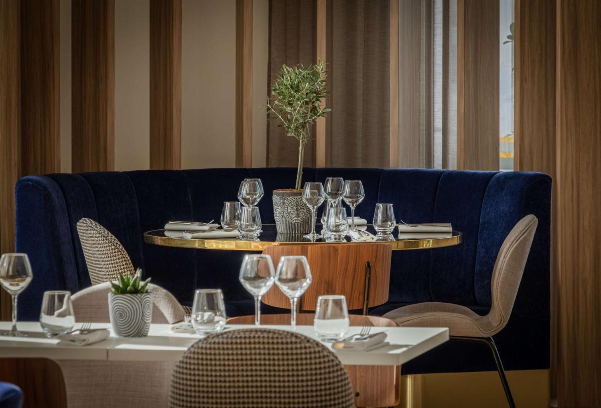Boissons dans l'établissement GOLDEN TULIP LYON OUEST TECHLID Hotel & Spa