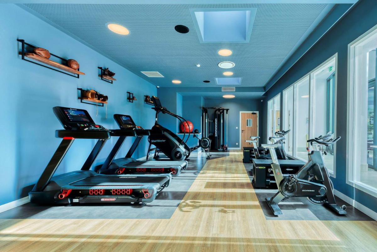 Salle ou équipements de sports de l'établissement GOLDEN TULIP LYON OUEST TECHLID Hotel & Spa