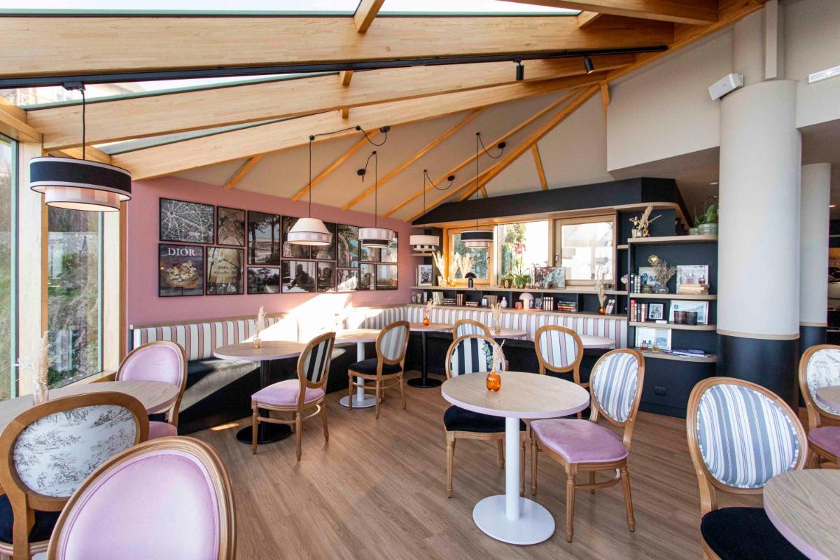 Restaurant ou autre lieu de restauration dans l'établissement Mercure Granville Le Grand Large