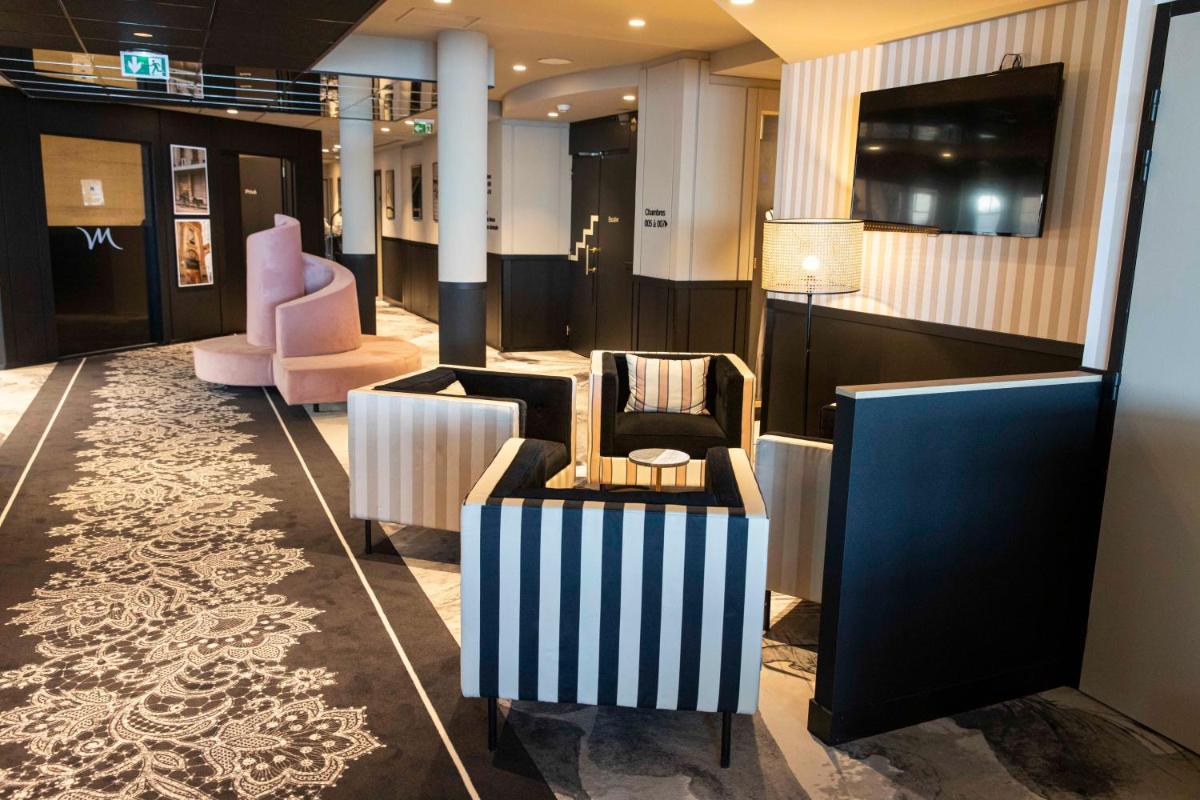 Coin salon dans l'établissement Mercure Granville Le Grand Large