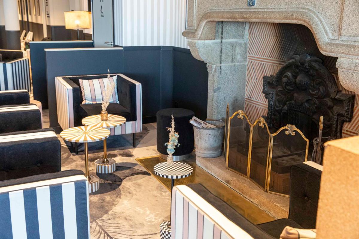 Coin salon dans l'établissement Mercure Granville Le Grand Large
