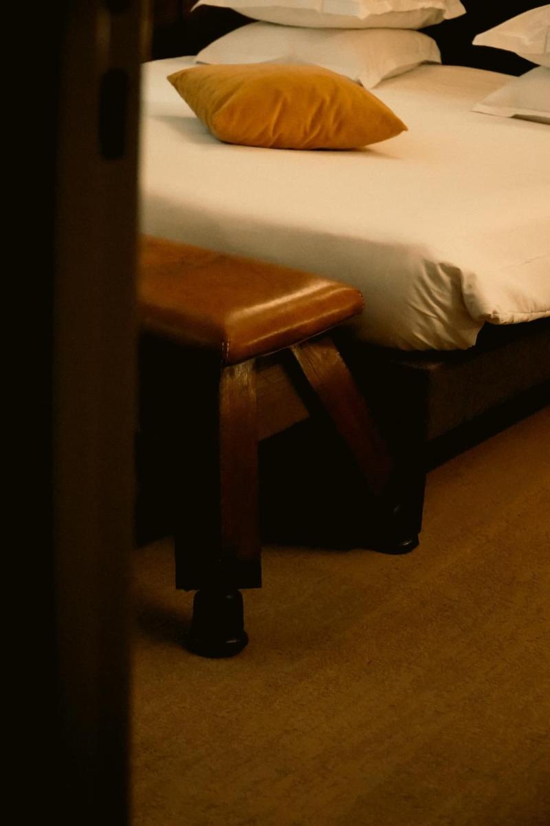 Un ou plusieurs lits dans un hébergement de l'établissement Hôtel La Nouvelle République & Hammam