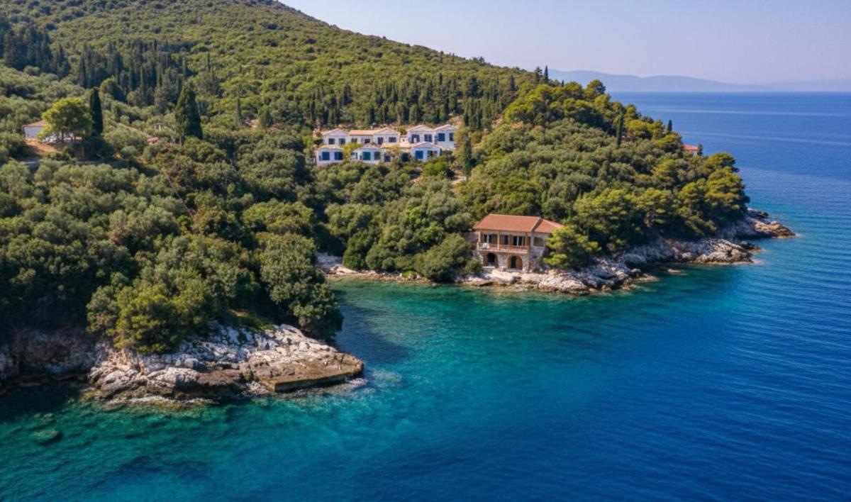 KAMINAKIA Apartments - Adults only policy - Sun drenched - Heavenly peaceful - A soothing oasis with a large swimming pool exclusively for guests' use - Sheltered on both sides by an evergreen cypress forest - Stunning sea views from every veranda - Housity