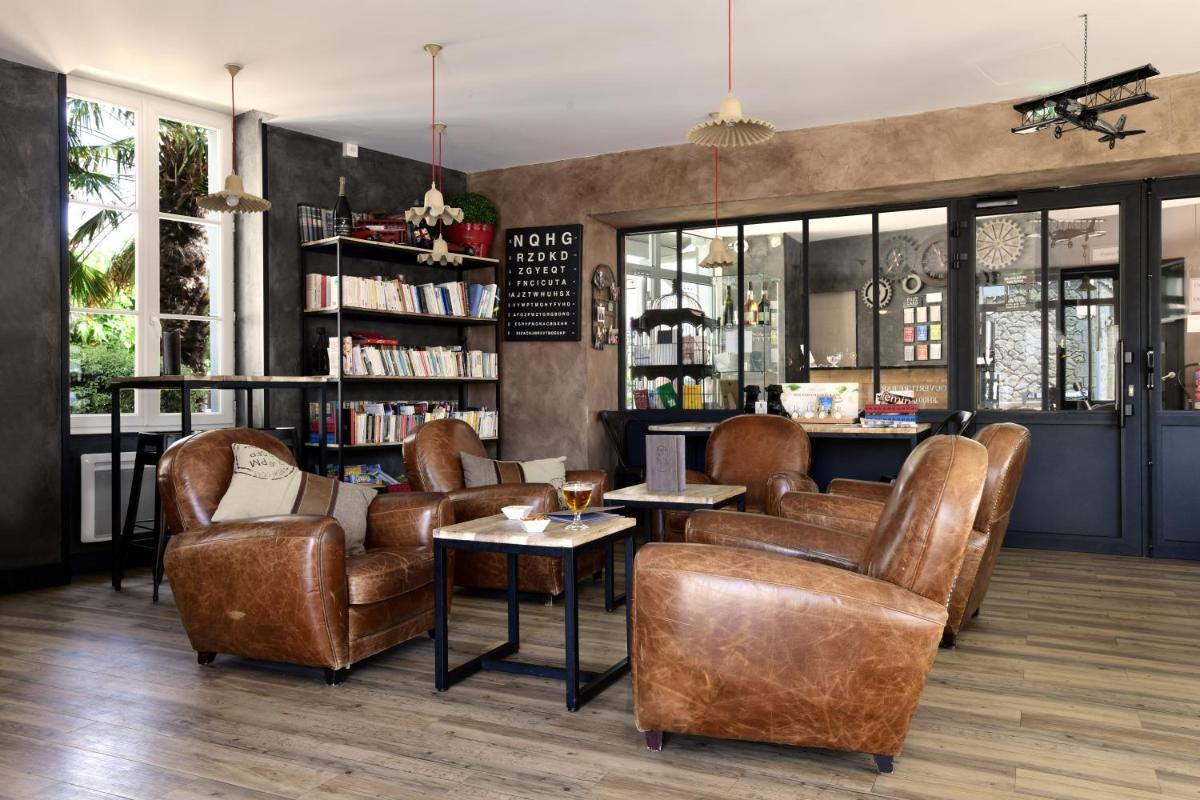 Coin salon dans l'établissement Grand Hôtel des Bains SPA
