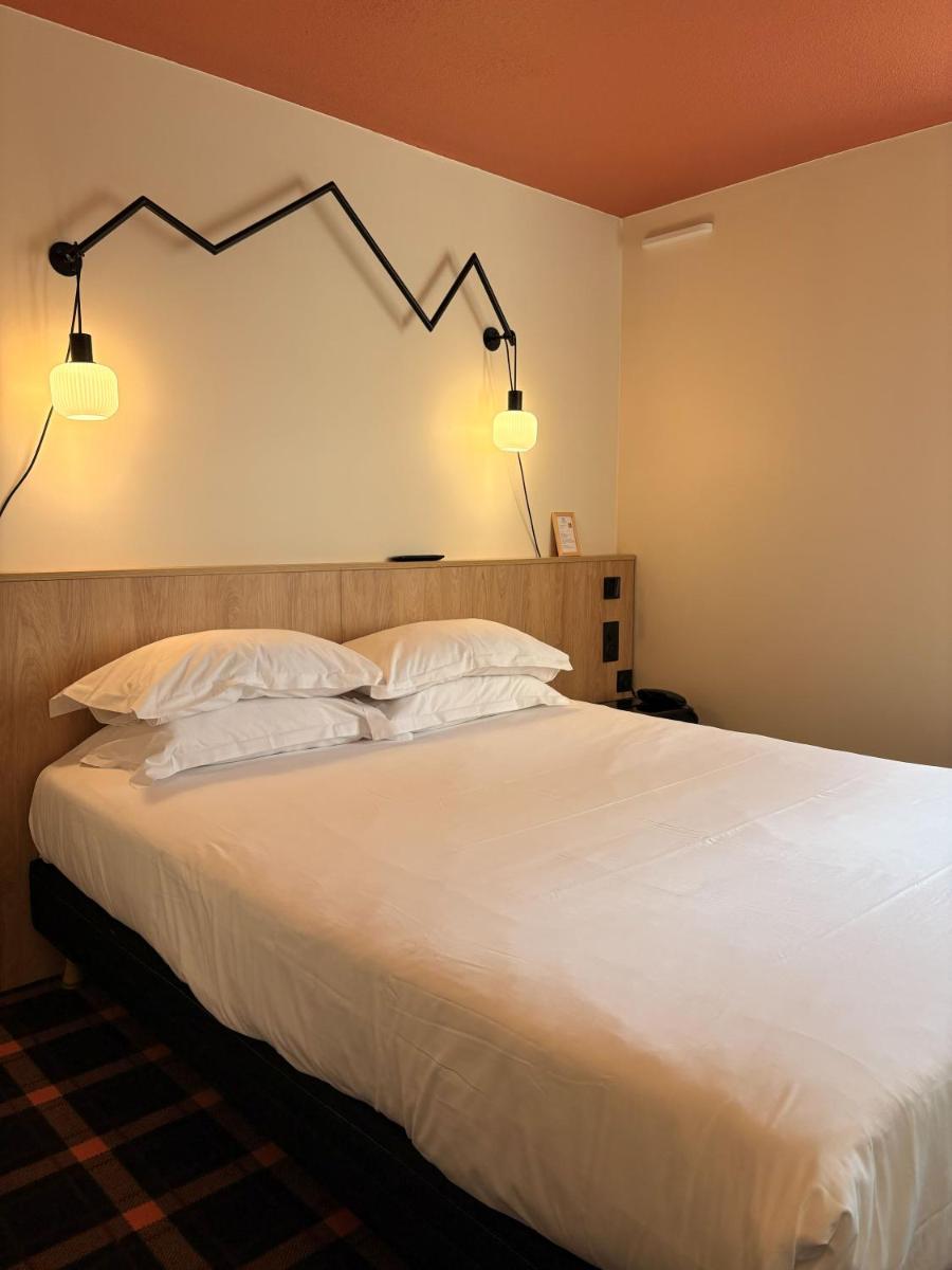 Un ou plusieurs lits dans un hébergement de l'établissement Sure Hotel by Best Western Annecy