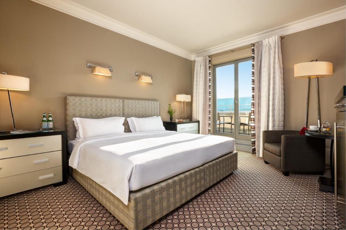Ein Bett oder Betten in einem Zimmer der Unterkunft Hotel De Rome Berlin