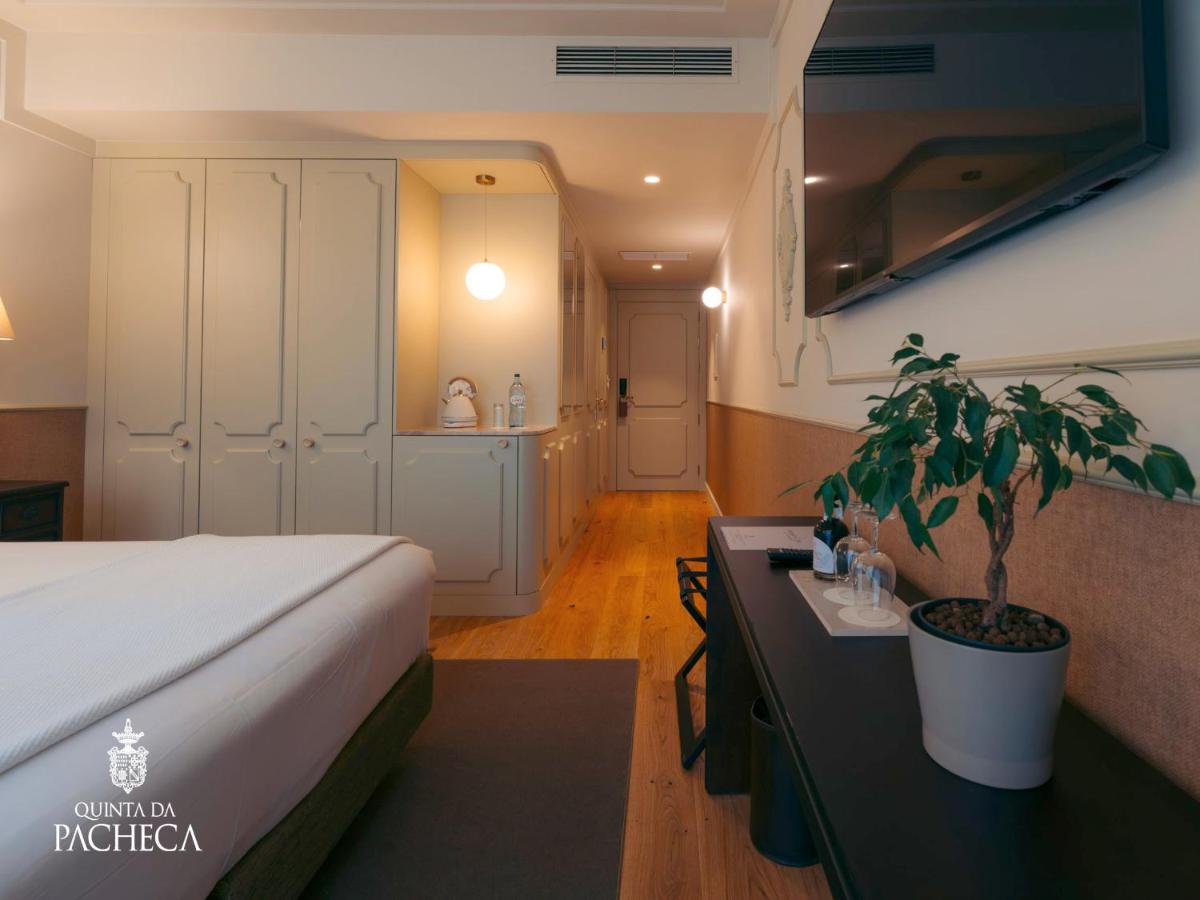 Uma cama ou camas num quarto em Pacheca The Wine House Hotel e Spa - Quinta da Pacheca