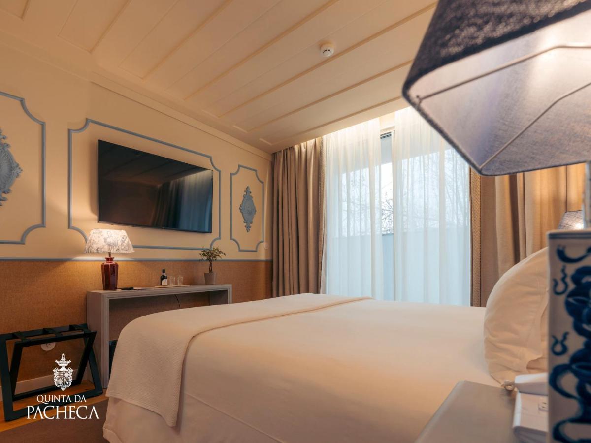 Uma cama ou camas num quarto em Pacheca The Wine House Hotel e Spa - Quinta da Pacheca