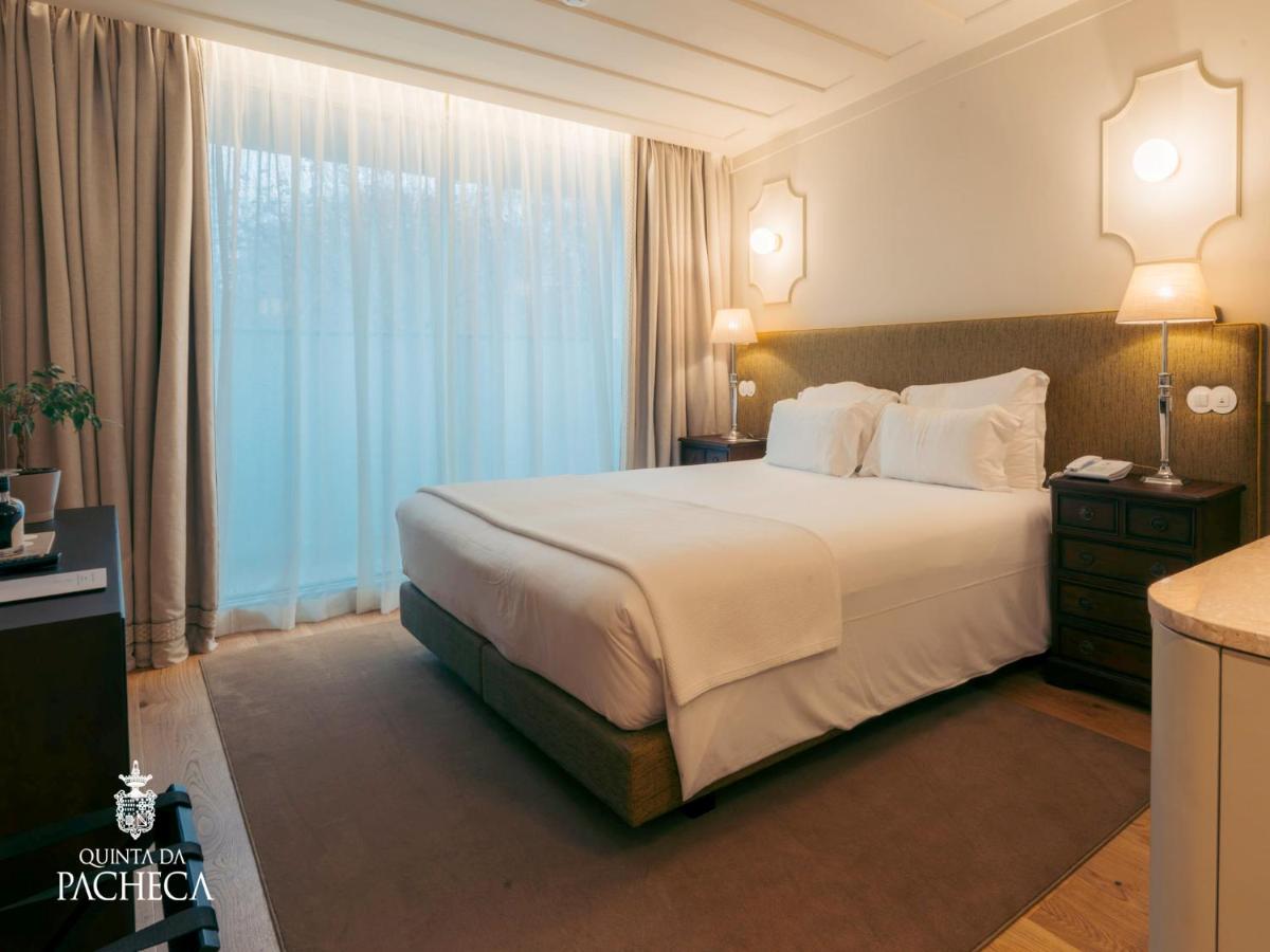 Uma cama ou camas num quarto em Pacheca The Wine House Hotel e Spa - Quinta da Pacheca