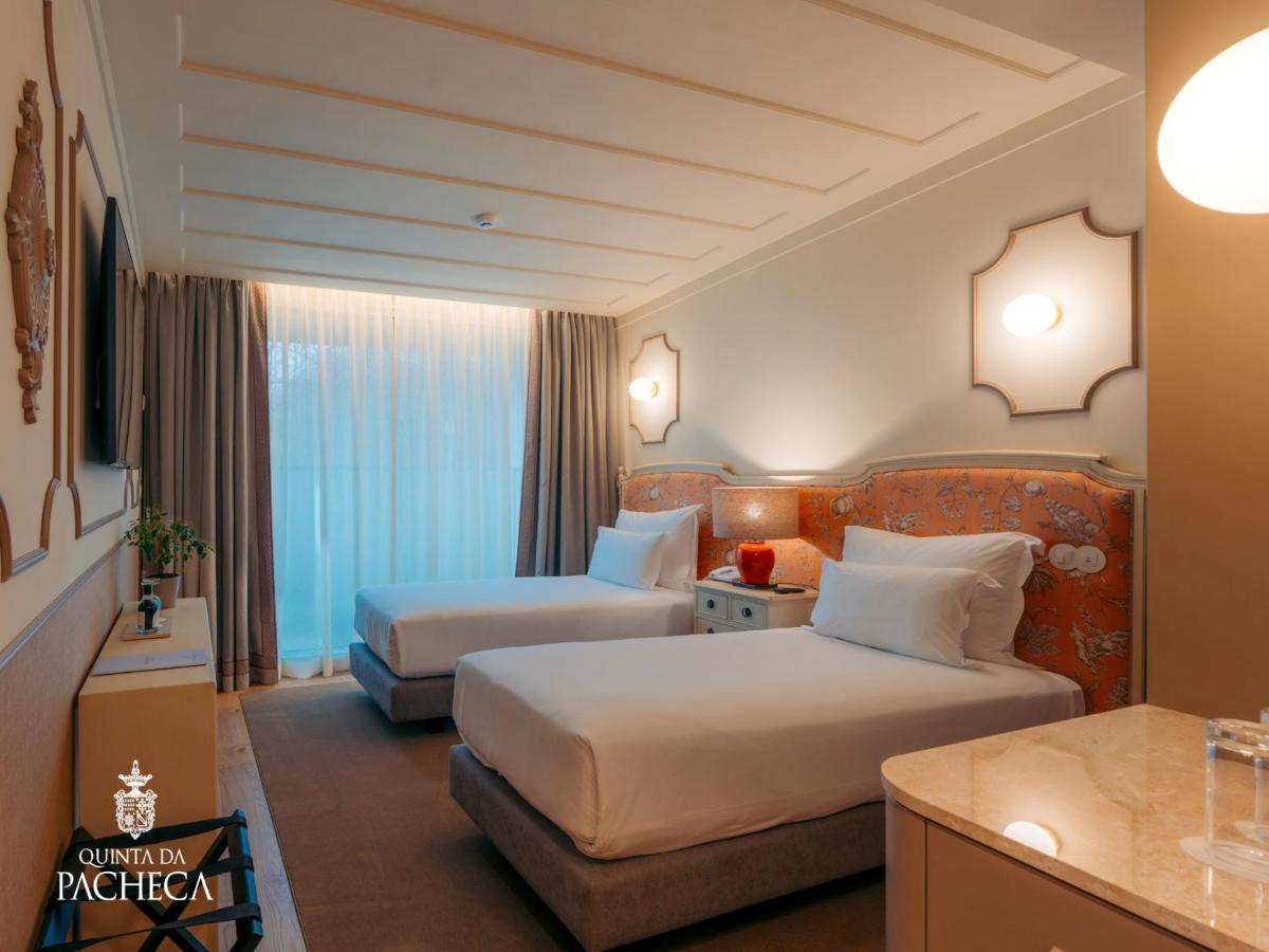 Uma cama ou camas num quarto em Pacheca The Wine House Hotel e Spa - Quinta da Pacheca