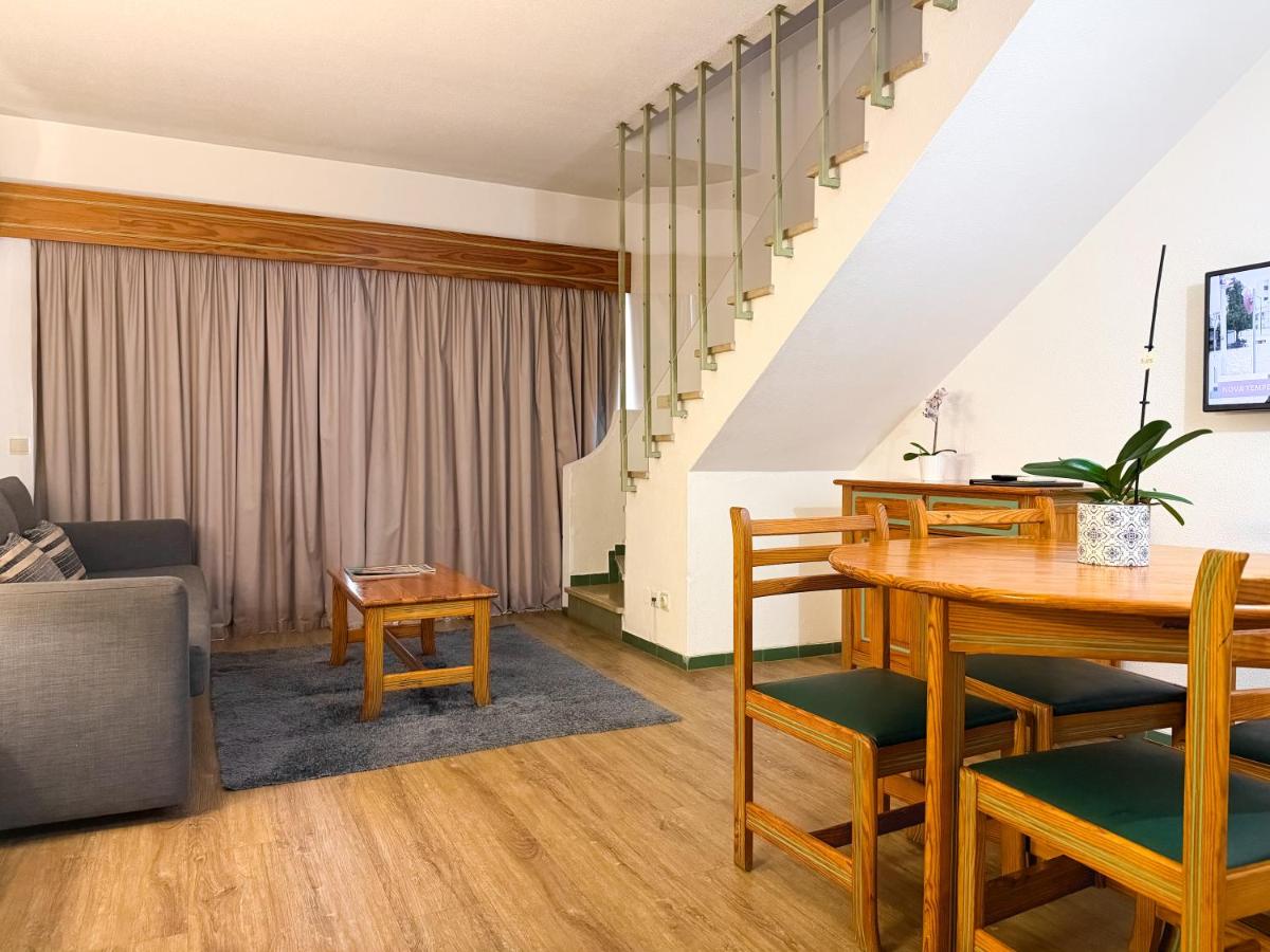 Uma área de estar em Luna Hotel da Oura