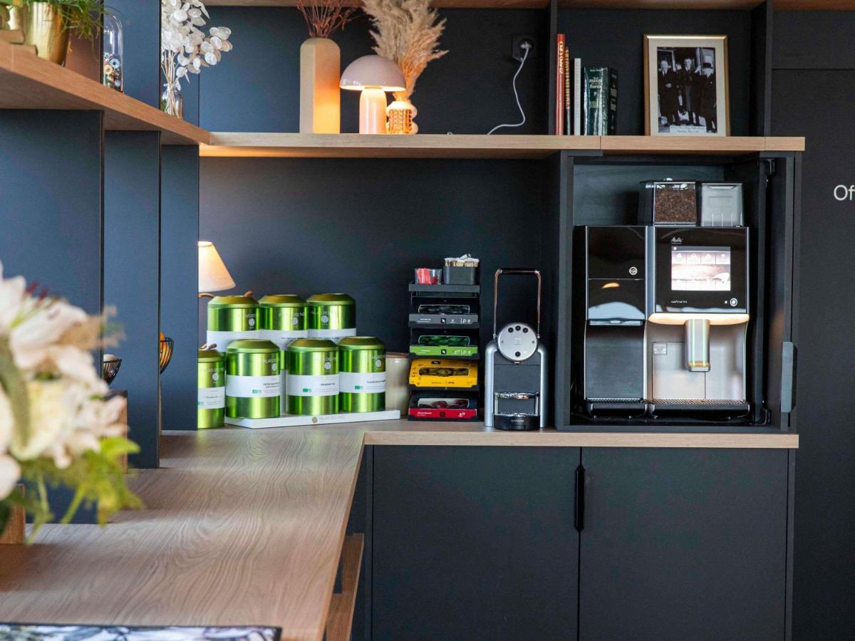 Cuisine ou kitchenette dans l'établissement Mercure Granville Le Grand Large